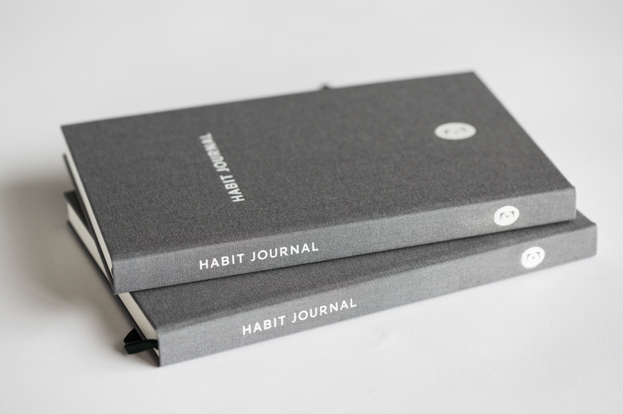 A Couple of Dark Grey Hardcover Evergreen Journals Habit Journals